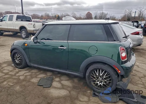 2011 Mini Cooper z USA, uszkodzony, nr VIN WMWSU3C56BT098326